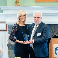 Distinguished Alumni receiving award